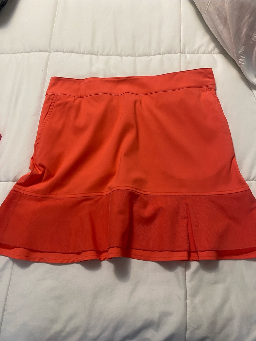 Women's Ruffle Hem Golf Skort in Bright Orange